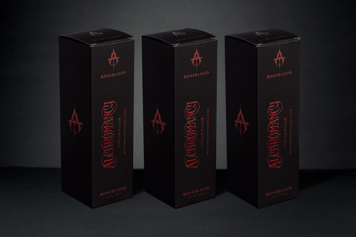 Three Roseblood House Editions, standing side by side.